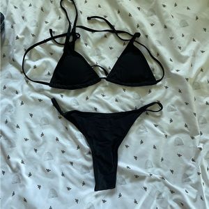 Size L black bikini. Fits more like a small/medium.
